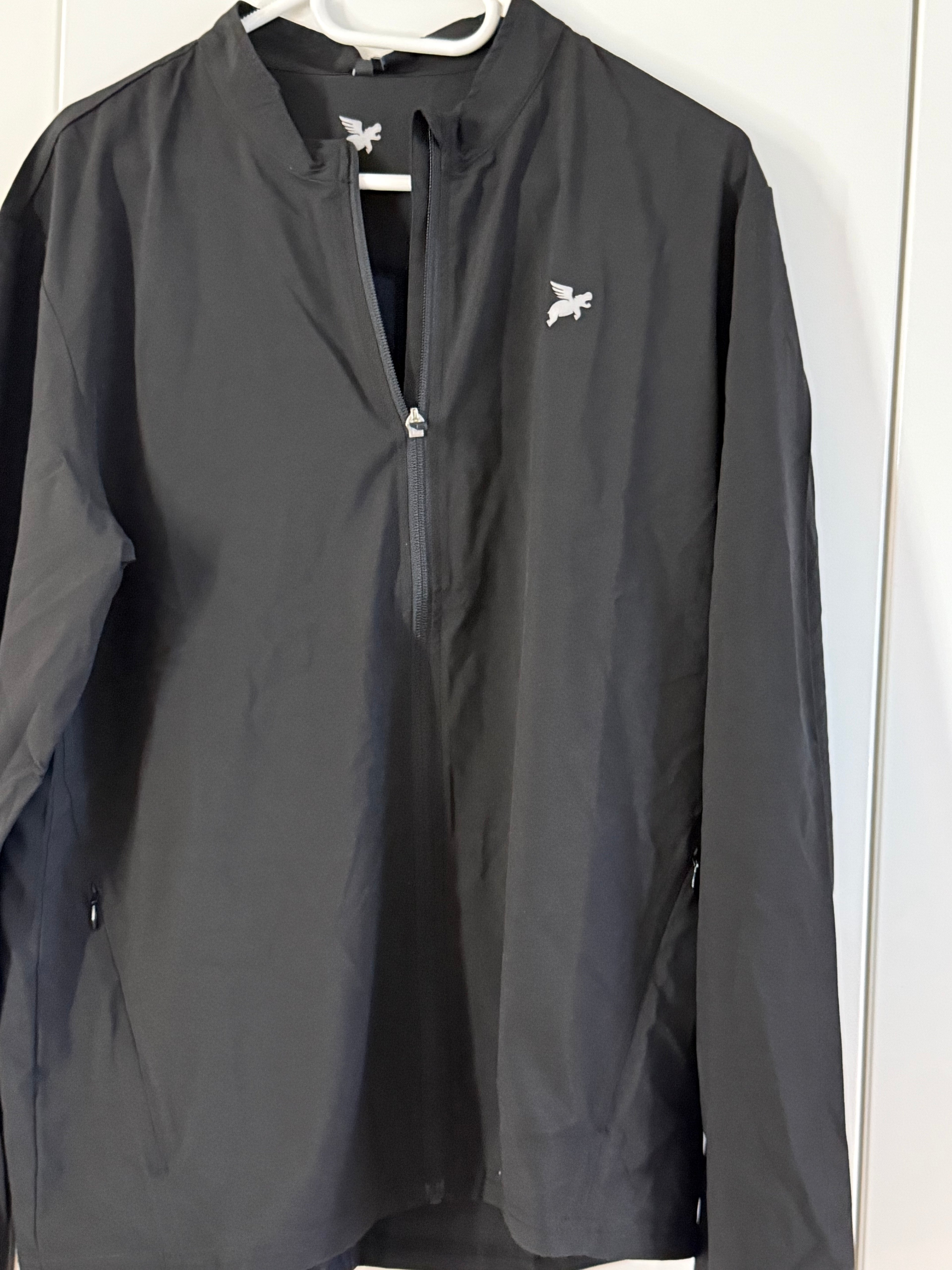 Despite Løbejakke sort Unisex