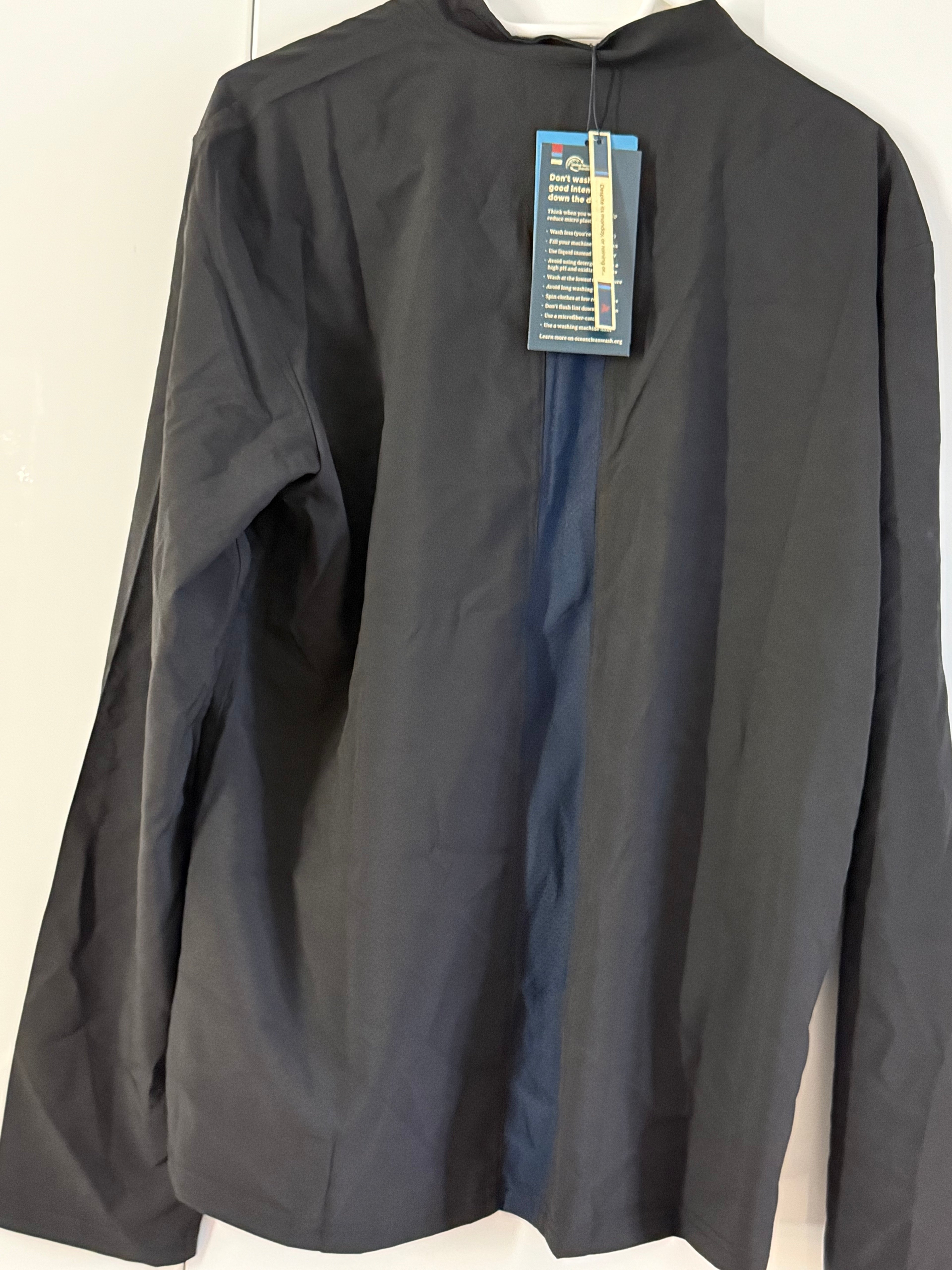 Despite Løbejakke sort Unisex